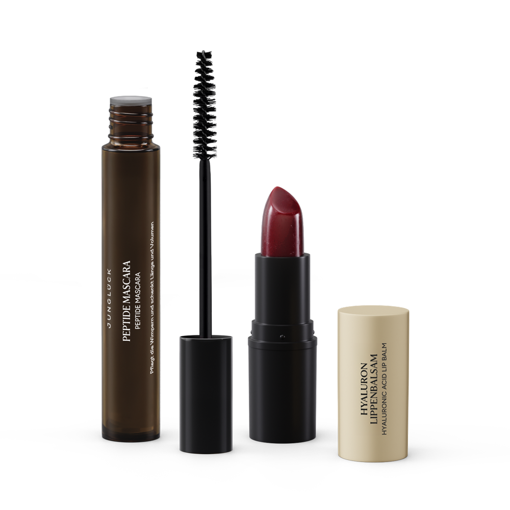 Das Beauty Essentials Beere Set beinhaltet eine Braunglasflasche mit Peptide Mascara, einen Lippenstift in dunkler