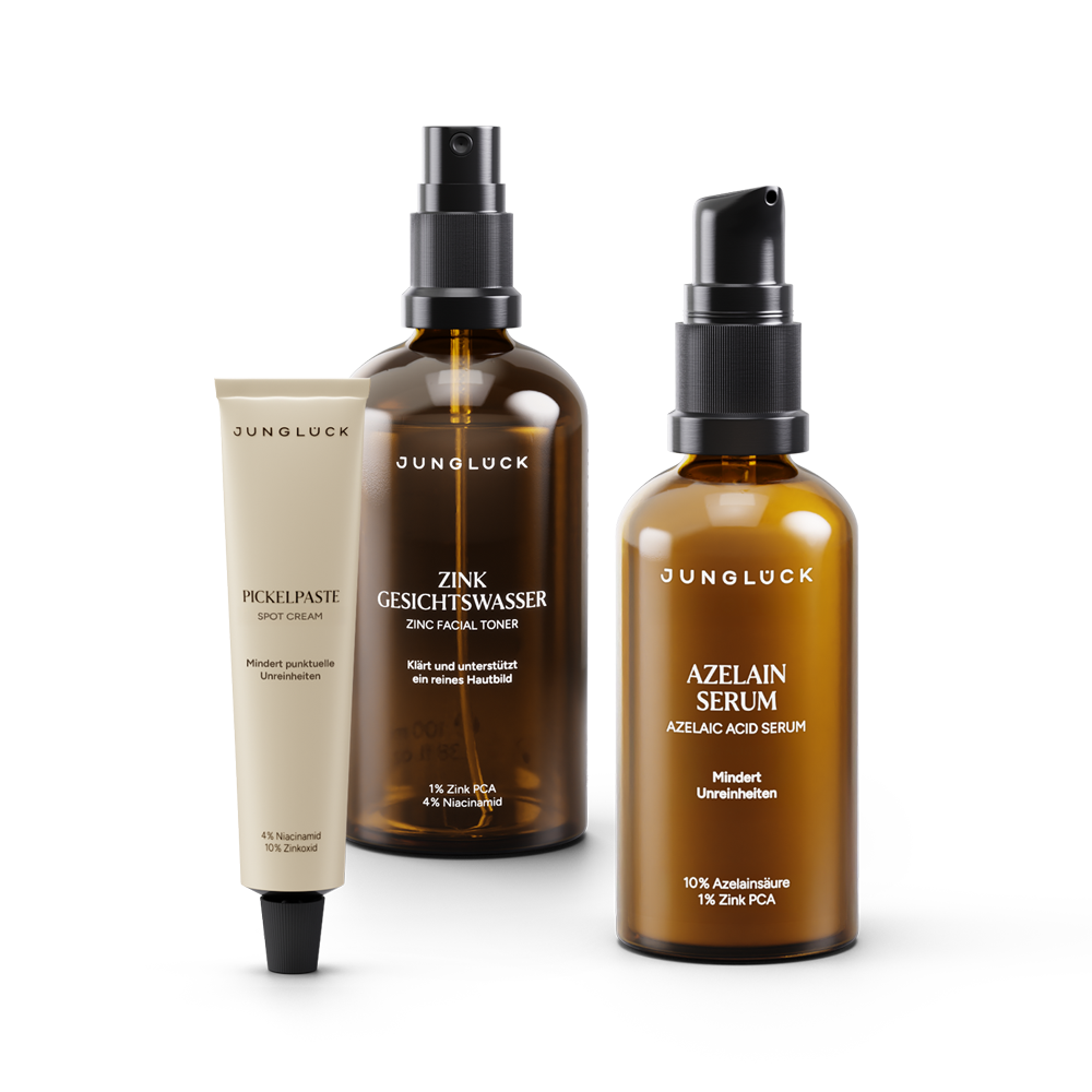 Set bestehend aus drei Produkten: Zink Gesichtswasser, Azelain Serum und Pickelpaste im Braunglas, für gezielte Hautpflege.