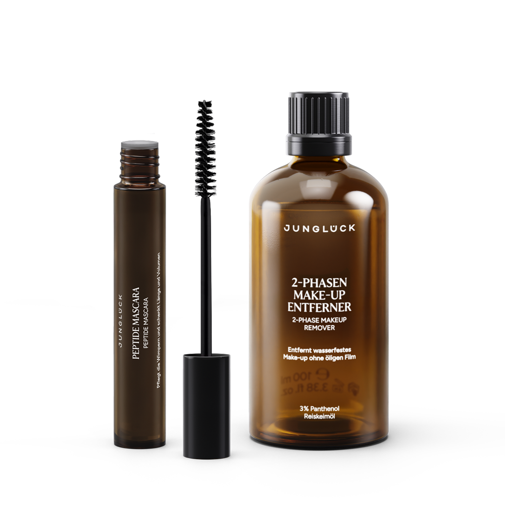 Ein Daily Wimpern Set bestehend aus einer braunen Flasche mit 2-Phasen Make-up Entferner und einer Wimperntusche in einem