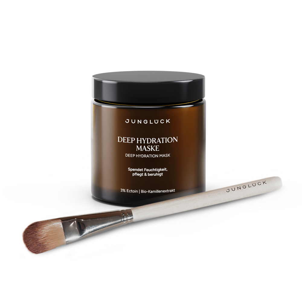 Braunglasbehälter mit der Aufschrift 'Deep Hydration Maske' und ein Anwendungspinsel. Kombination für intensive