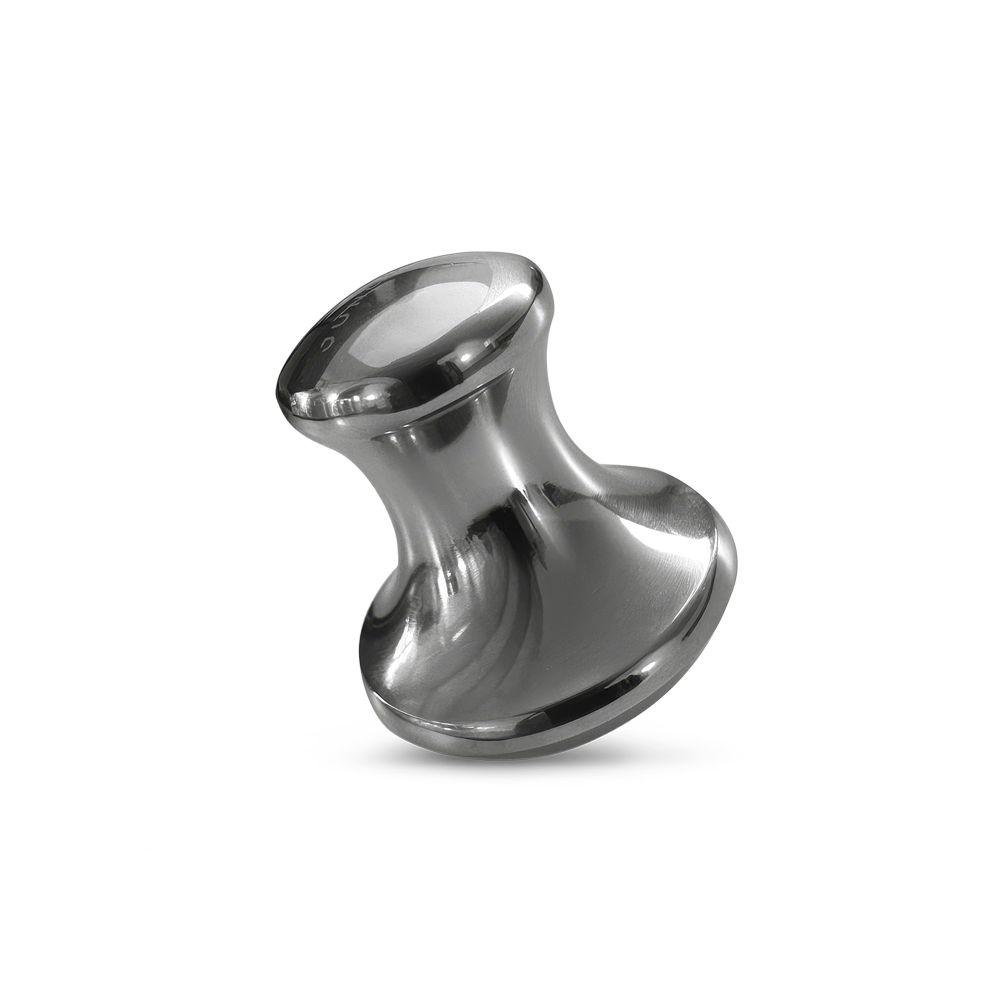 Shiny silver metal Augen Gua Sha facial massage tool with ergonomic curved design.