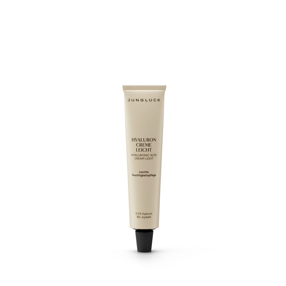 Beige hyaluron cream tube with black cap and minimalist black text design, 10 ml size.