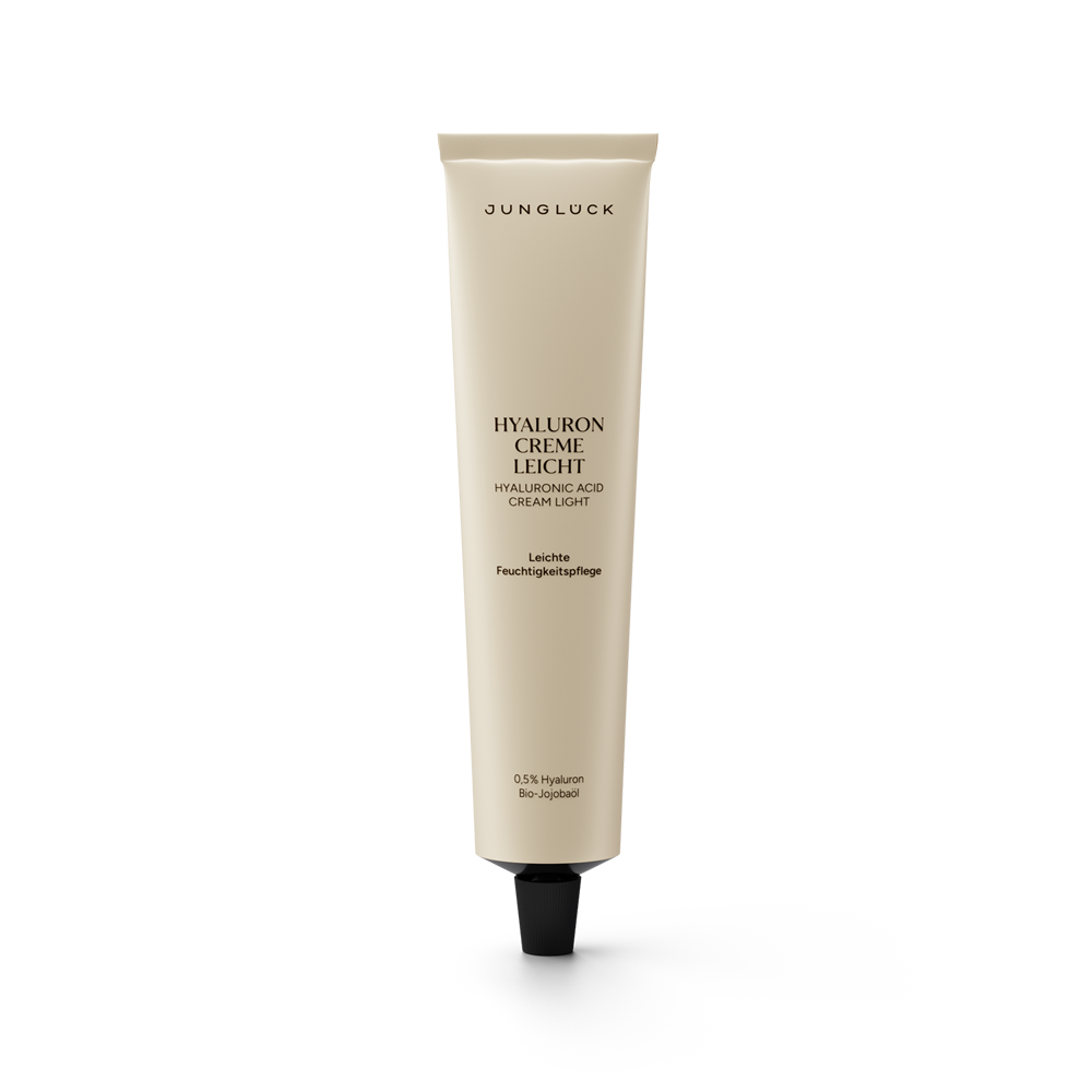 Beige tube of Junglück Hyaluron Creme Leicht with black cap and minimal black text design.