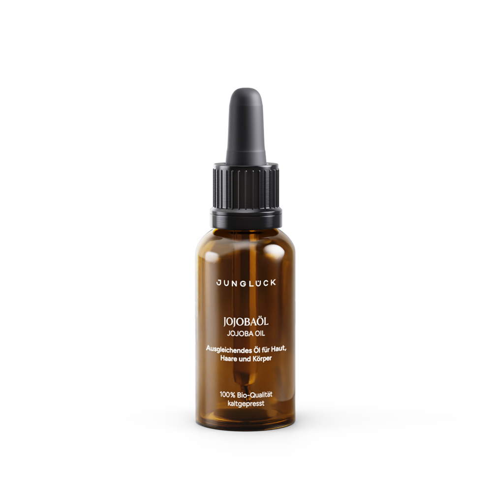 Amber glass dropper bottle of Junglock Jojobaöl with black cap and white text, 20 ml size.