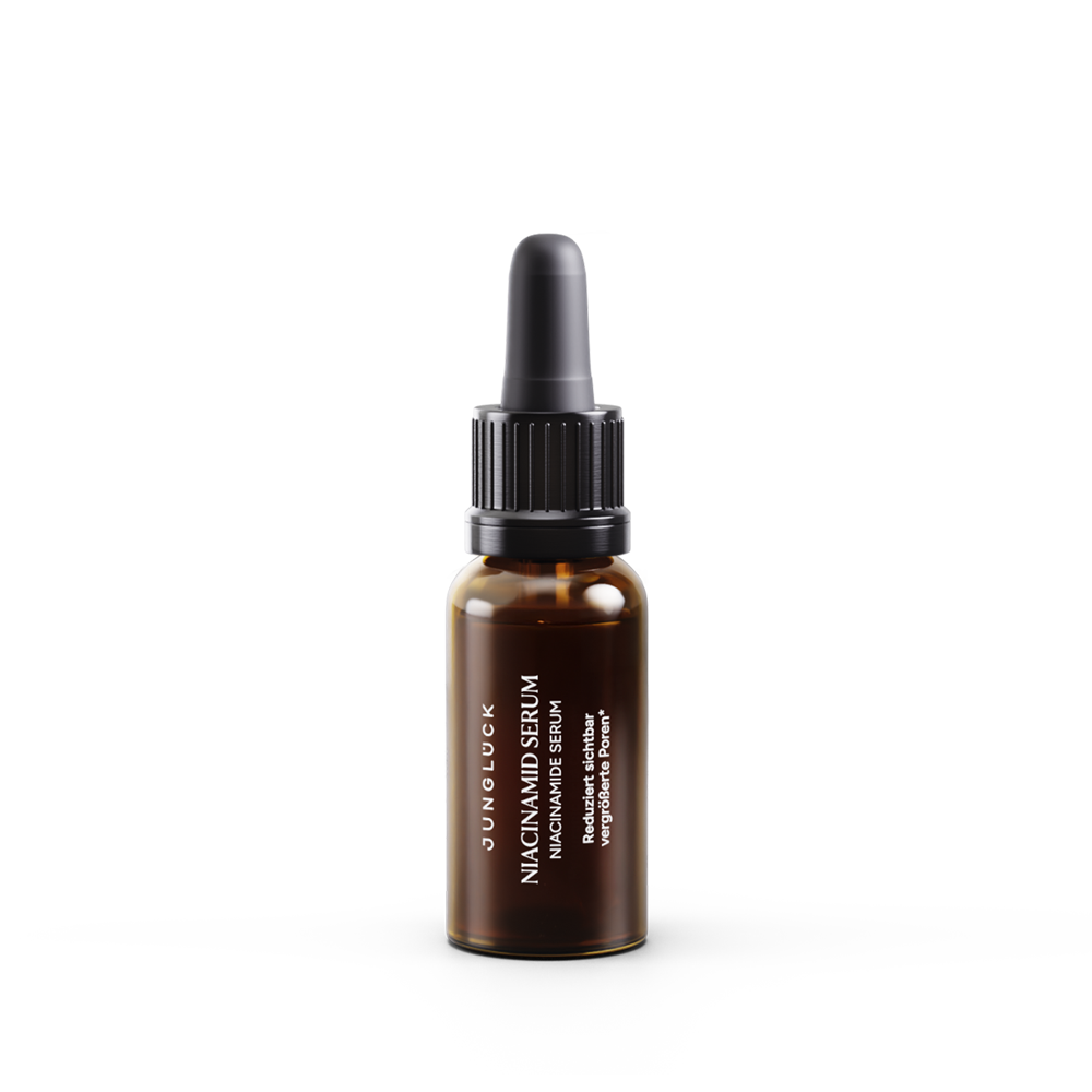 Brown glass dropper bottle with white text labeled Niacinamid Serum, 10 ml size.
