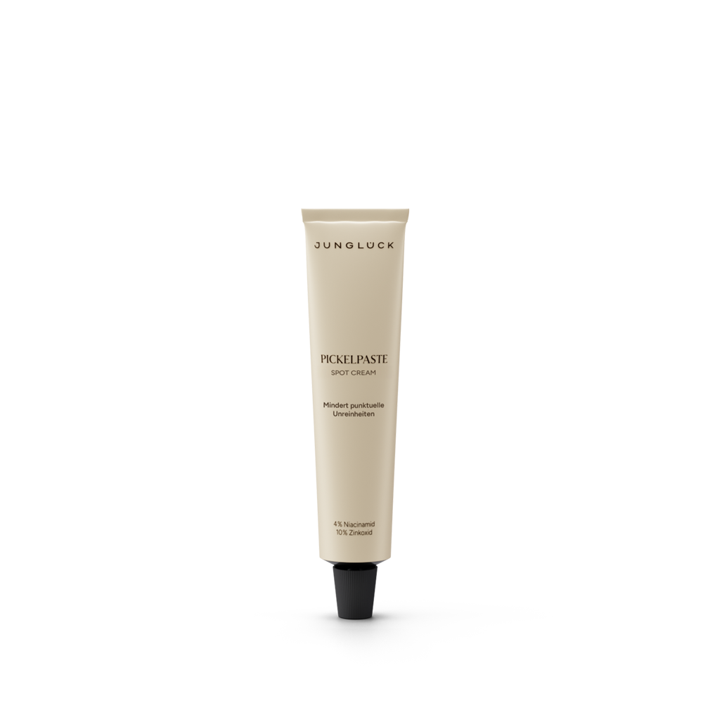 Beige tube of Pickelpaste facial care cream with black cap and minimal text design.