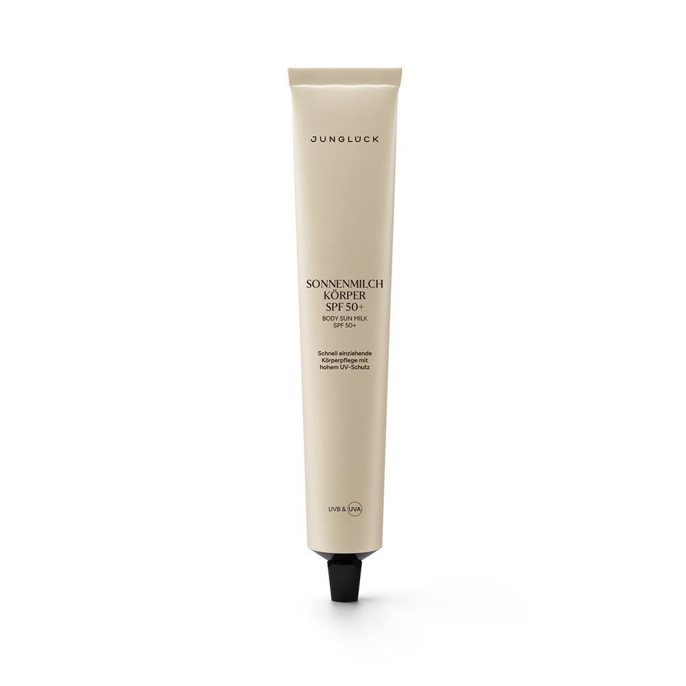 Beige tube of Junglück Sonnenmilch Körper SPF 50+ sun lotion with black cap, 100 ml.